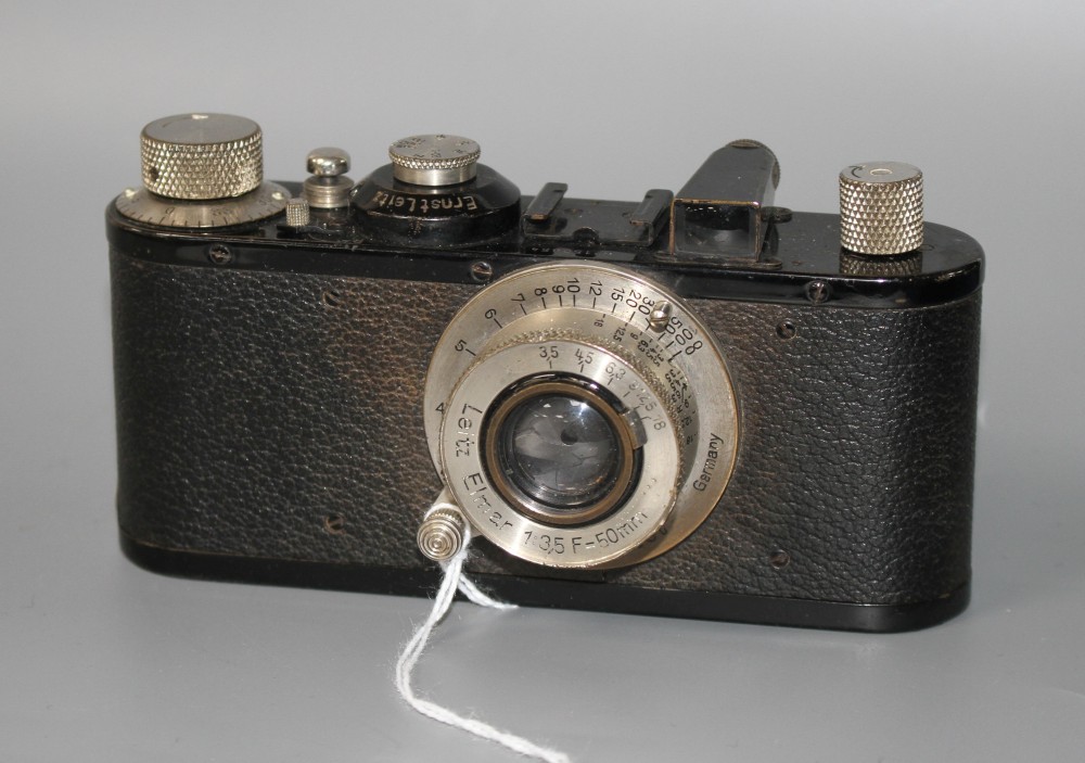 An Ernst Leitz 35mm camera, no. 150854, with Elmar 1:35 50mm lens, 13cm, height 7cm